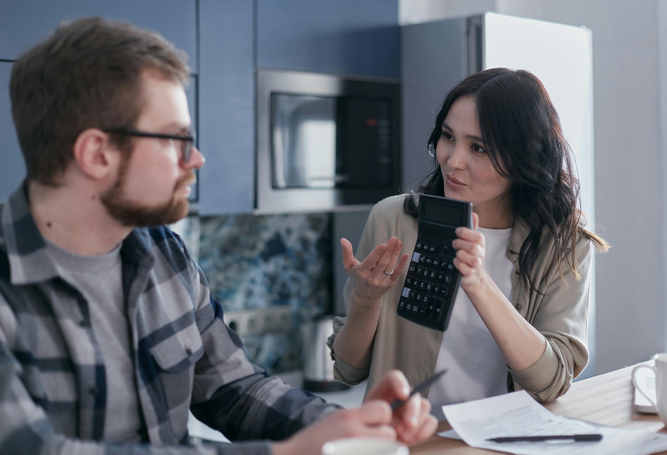 accountant explaining tax returns to her client